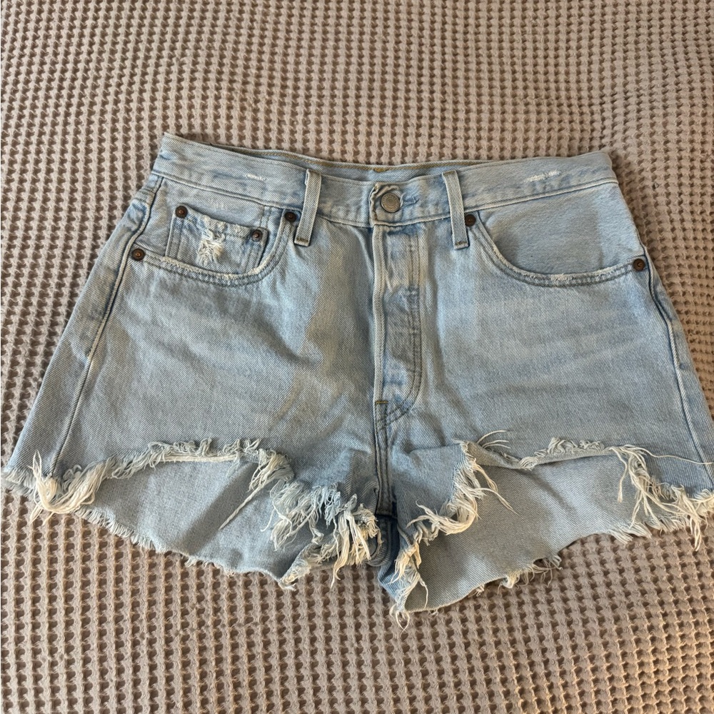 501 Light Blue Distressed Denim Shorts